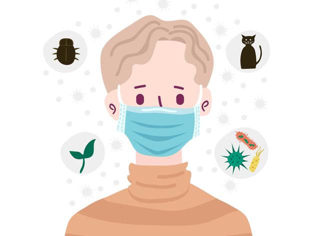 人们戴着口罩，以避免吸入空气中的污染物。